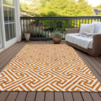 5' X 8' Orange And Ivory Geometric Washable Indoor Outdoor Area Rug